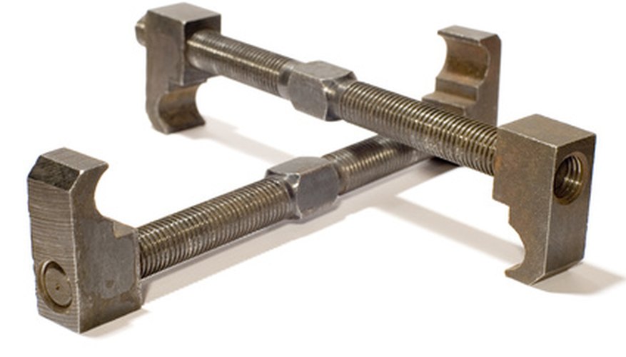Bar clamps secure wide, flat items. Bar clamps secure wide, flat items.