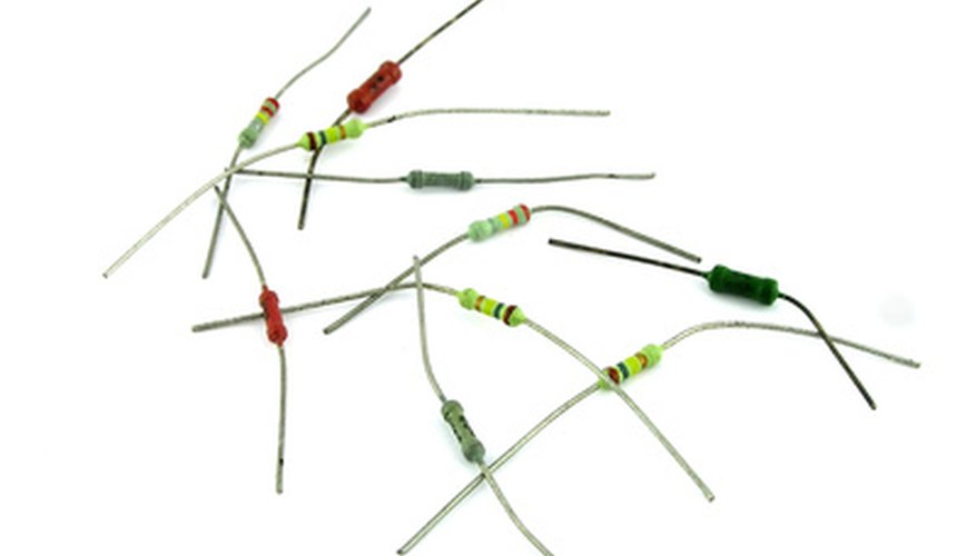 Resistors are yellow with stripes, a zener diode is the black component. Resistors are yellow with stripes, a zener diode is the black component.