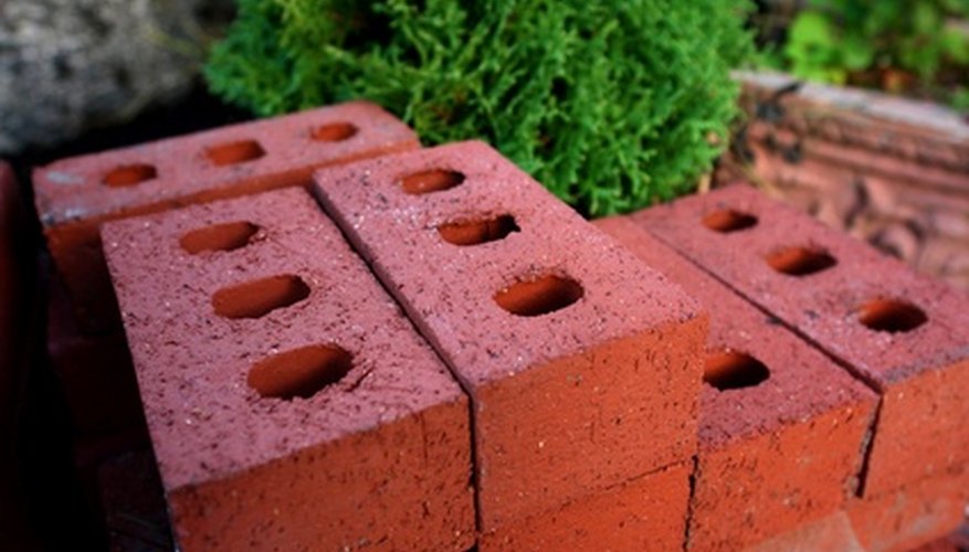 Landscaping blocks make a sturdy and often inexpensive material to edge garden beds with and can be adapted to any shape you want. Landscaping blocks make a sturdy and often inexpensive material to edge garden beds with and can be adapted to any shape you want.