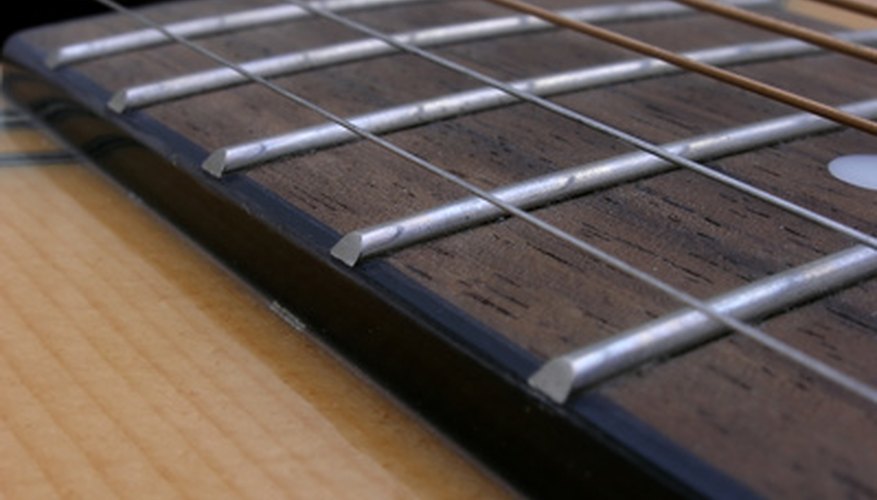 Photo Credit: close strings image by Kimberly Reinick from <a href='http://www.fotolia.com'>Fotolia.com</a> The