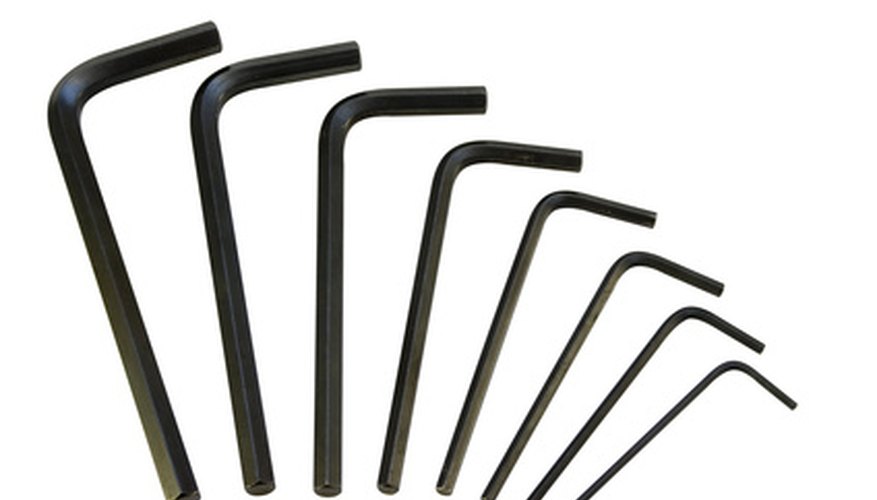 Photo Credit: allen keys image by Christopher Dodge from <a href='http://www.fotolia.com'>Fotolia.com</a> Allen wrenches come in a variety of sizes; select the size that fits the screws on your bicycle.