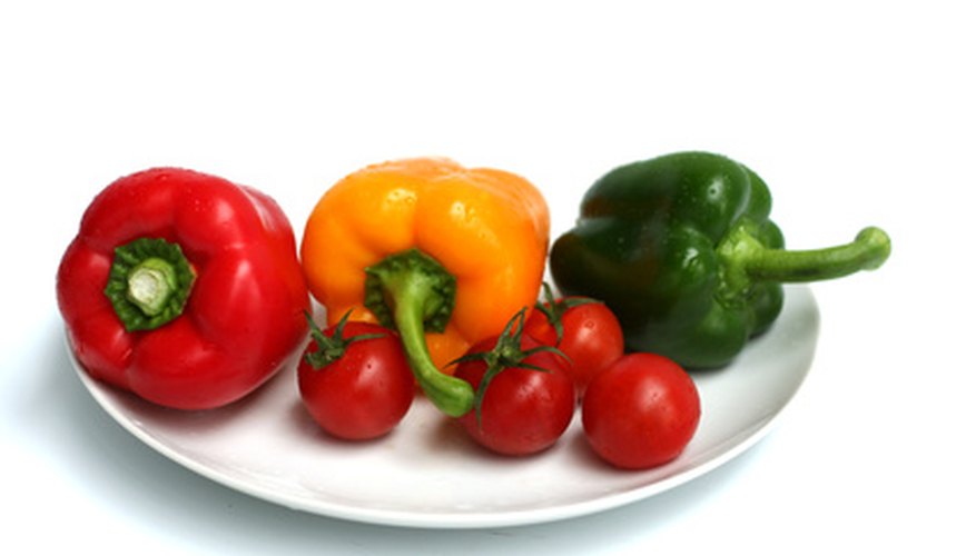 Tomatoes and peppers are both nutritious garden vegetables. Tomatoes and peppers are both nutritious garden vegetables.
