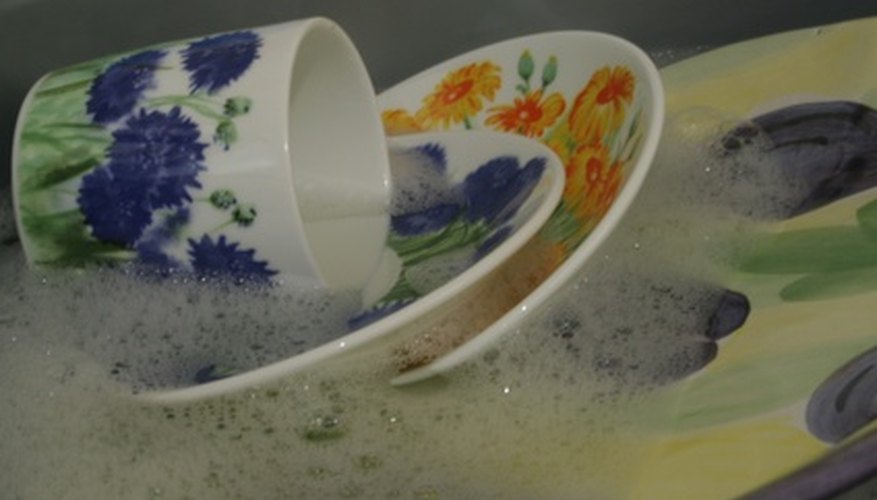 Washing dishes is one of many household chores for teens. Washing dishes is one of many household chores for teens.