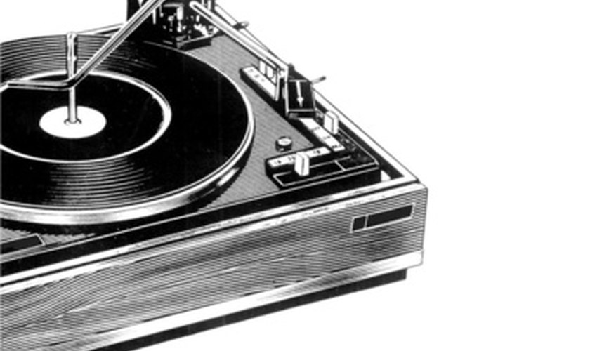 Photo Credit: black record player graphic image by catherine rogers from <a href='http://www.fotolia.com'>Fotolia.com</a> A classic
