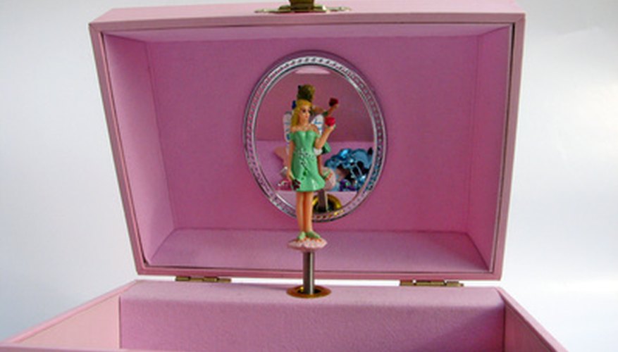 A dancing ballerina inside a musical box will likely fascinate any little girl. A dancing ballerina inside a musical box will likely fascinate any little girl.