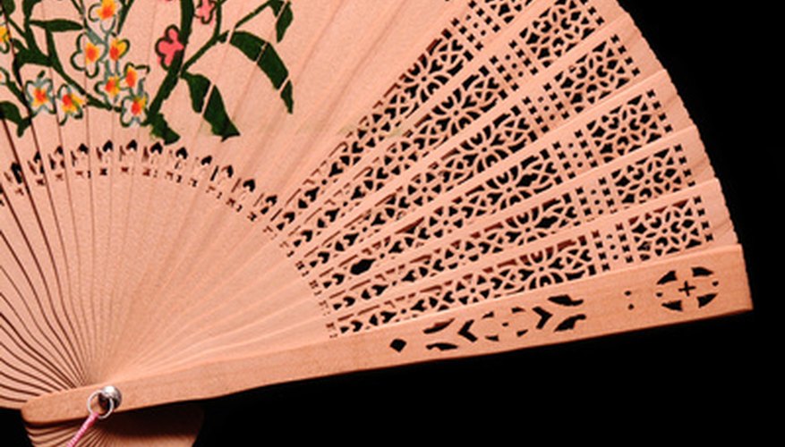 Photo Credit: bamboo fan detail image by Scott Williams from <a href='http://www.fotolia.com'>Fotolia.com</a> The Victorian Era created a style of ornate designs.