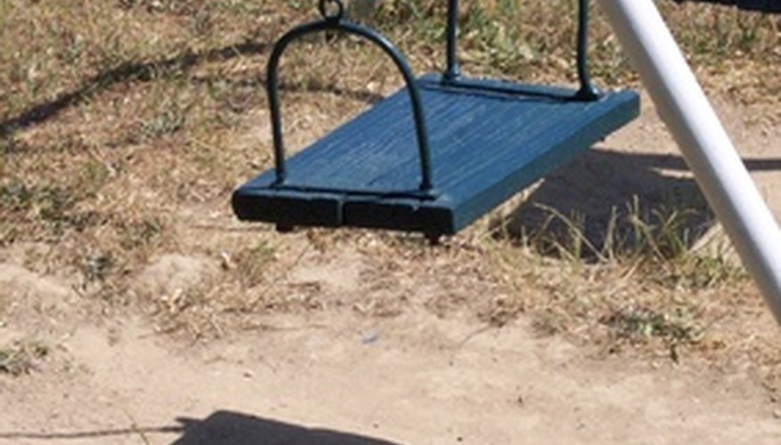 Keeping grass and weeds out of a play area is challenging. Keeping grass and weeds out of a play area is challenging.