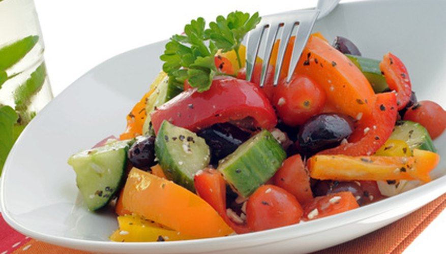 Fresh strawberries and tomatoes make a nice addition to summer salads. Fresh strawberries and tomatoes make a nice addition to summer salads.