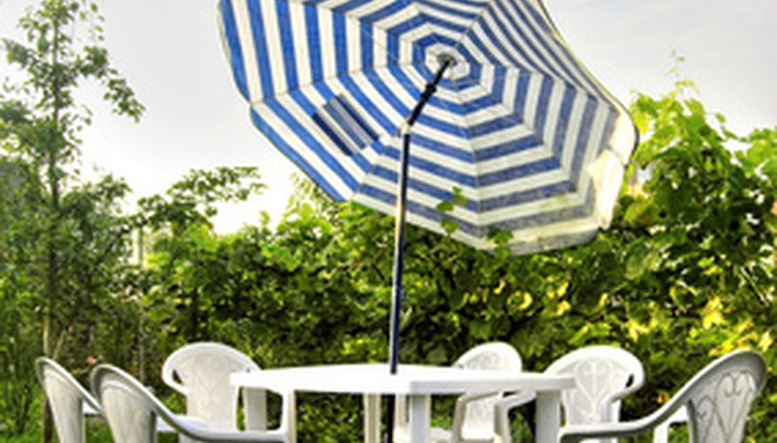 Protect a vinyl umbrella from the elements with a vinyl sealer. Protect a vinyl umbrella from the elements with a vinyl sealer.