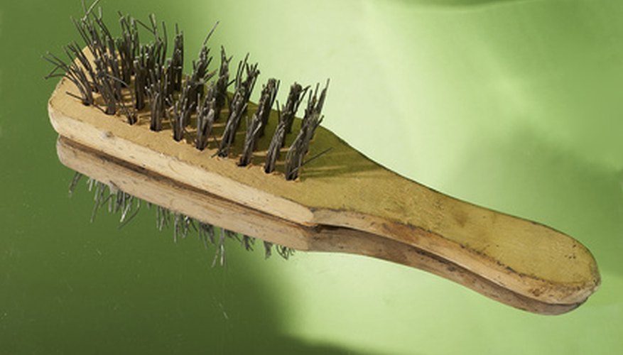 Remove any chunks of rust by scraping them with a wire brush. Remove any chunks of rust by scraping them with a wire brush.