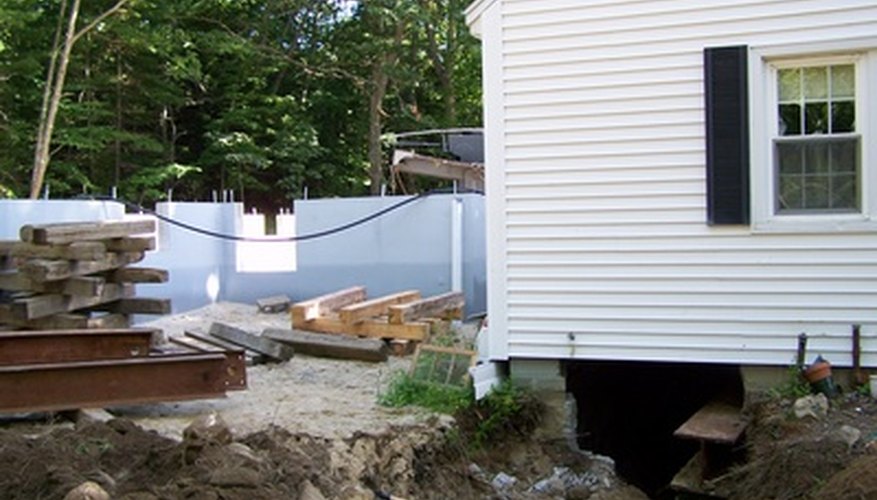 Paint a house foundation. Paint a house foundation.