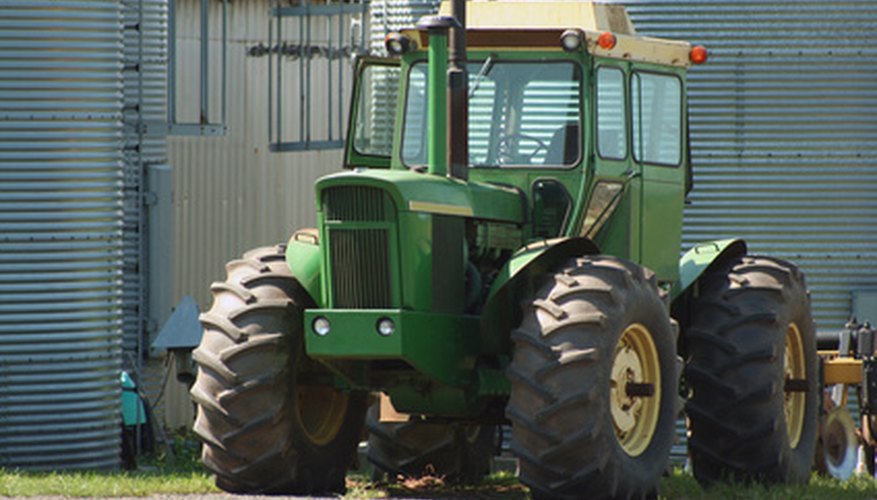 Make a wooden toy tractor to inspire your children's imagination. Make a wooden toy tractor to inspire your children's imagination.