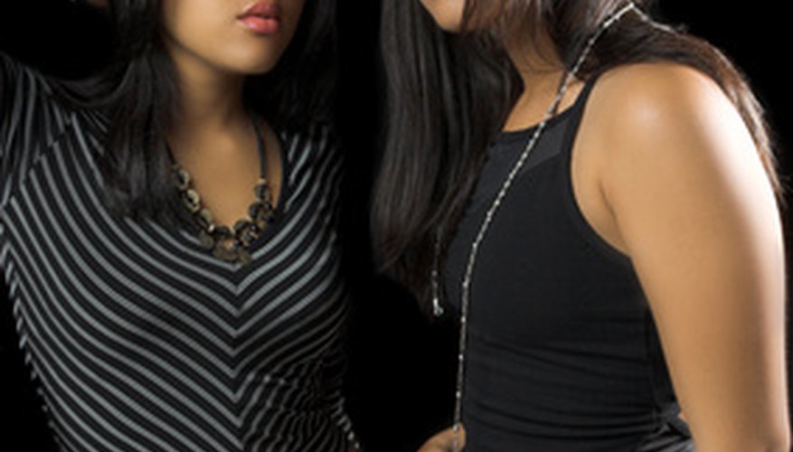 Photo Credit: two hip teenagers image by Elke Dennis from <a href='http://www.fotolia.com'>Fotolia.com</a> Stylish backup dancers are a key element of rap music videos.