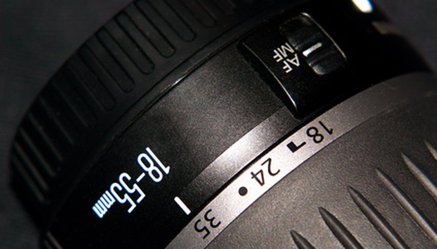 Photo Credit: lens image by leafy from <a href='http://www.fotolia.com'>Fotolia.com</a> An example of a typical Canon EF lens with Auto-Focus capabilities