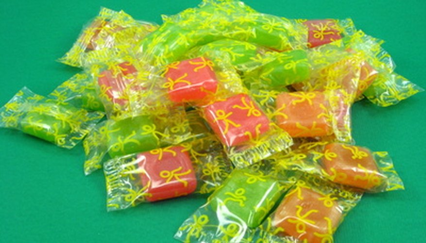 When the pinata breaks, the candy scatters on the ground to delight the children. When the pinata breaks, the candy scatters on the ground to delight the children.