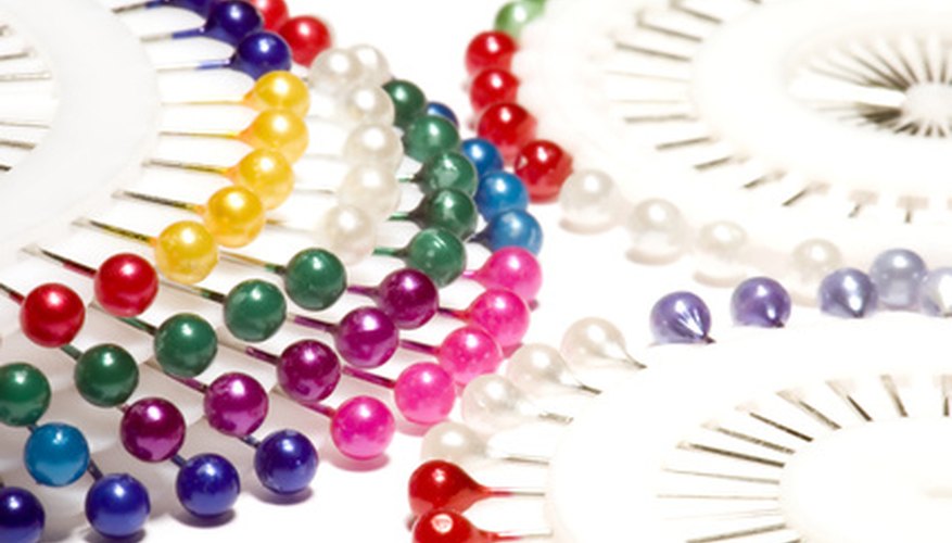 Bright-colored pins are easier to see and less likely to be accidentally left in the fabric. Bright-colored pins are easier to see and less likely to be accidentally left in the fabric.
