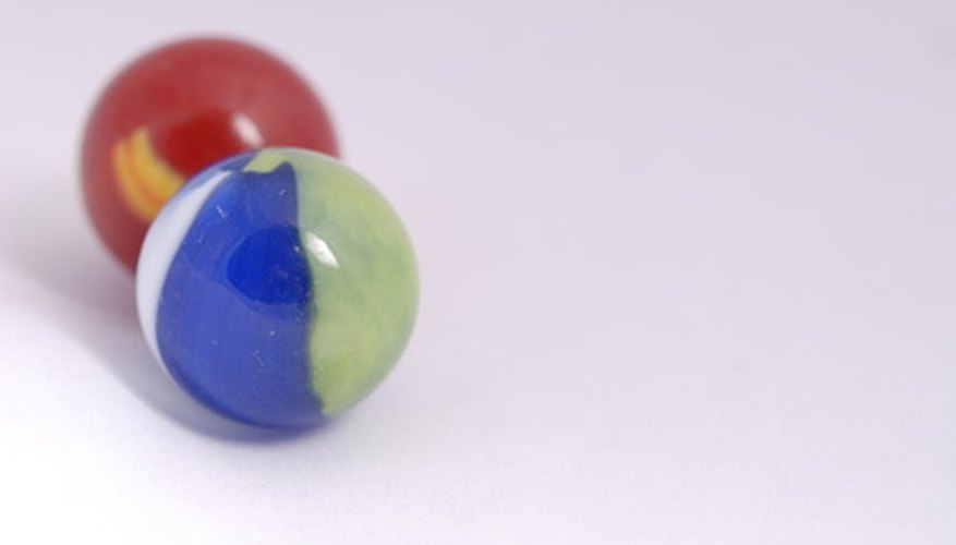 Colonial kids enjoyed playing marbles. Colonial kids enjoyed playing marbles.