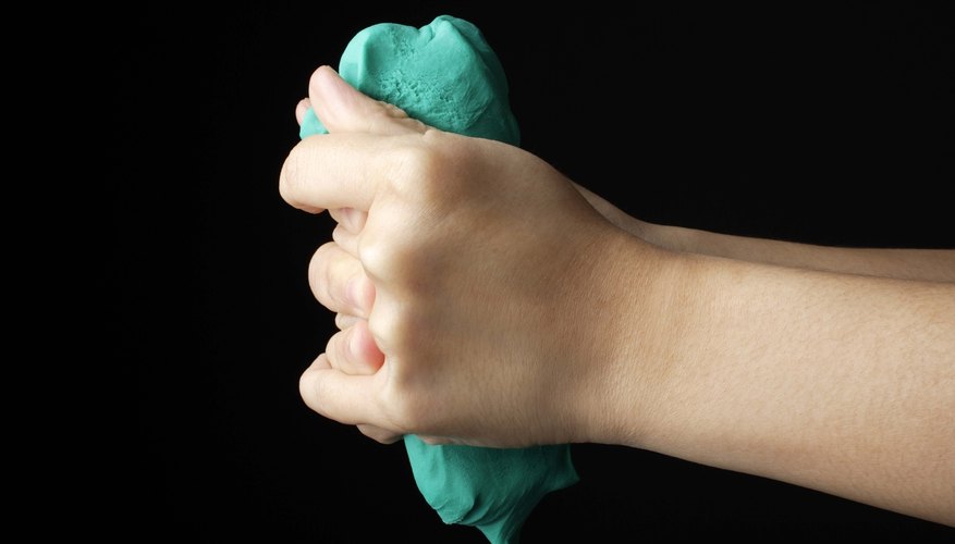 Photo Credit: Jupiterimages/Goodshoot/Getty Images Make features and elements out of clay.