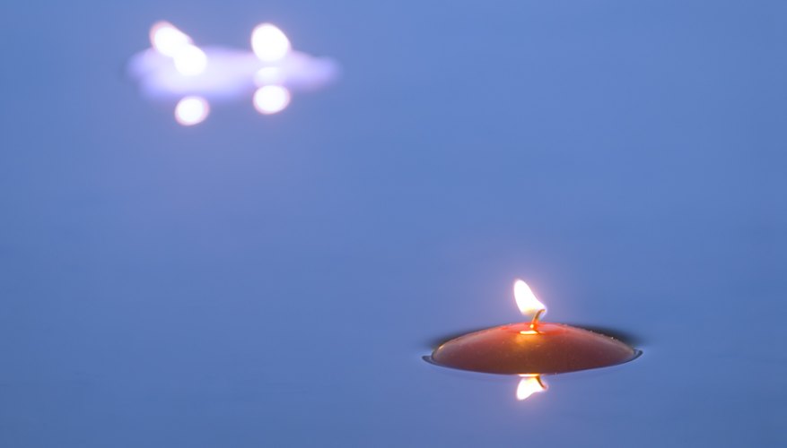 Candles floating on water. Candles floating on water.