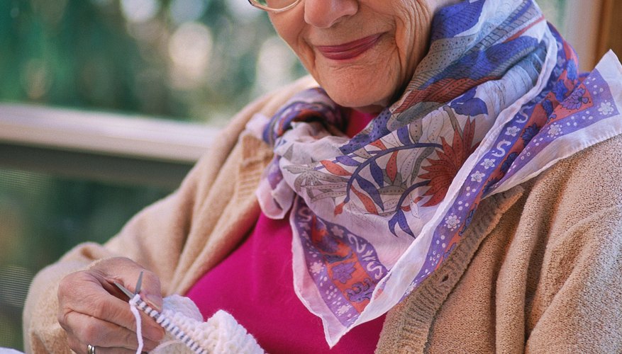 Knitting a basketweave baby blanket uses only two simple stitches, knit and purl. Knitting a basketweave baby blanket uses only two simple stitches, knit and purl.