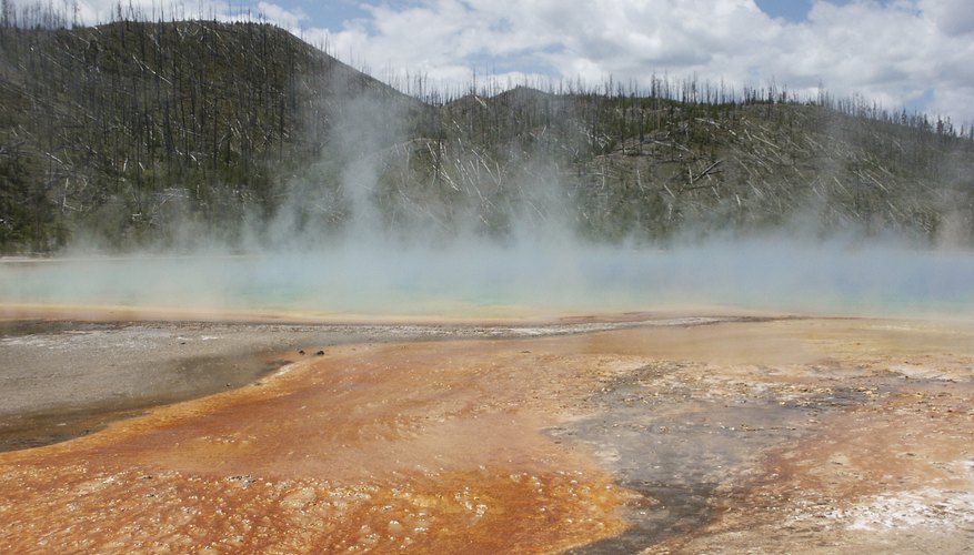 Rusty orange hematite formations near hot springs in Yellowstone National Park. Rusty orange hematite formations near hot springs in Yellowstone National Park.