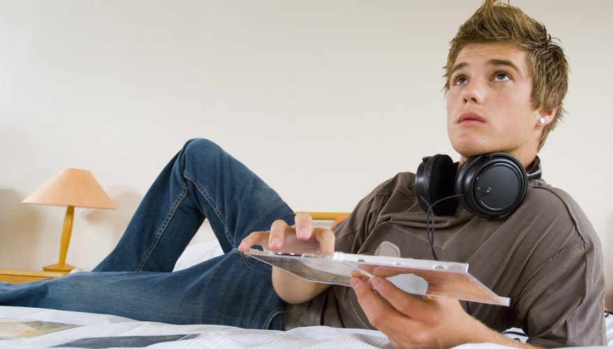 Boy listening to CD Boy listening to CD