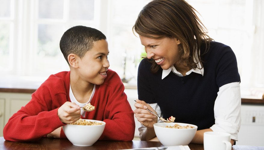 boy eating cereal boy eating cereal