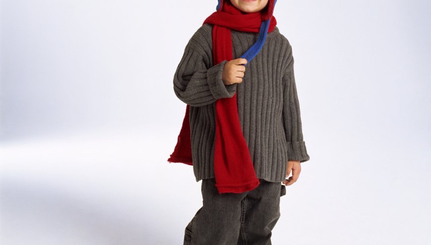 Sing songs about hats and scarves with your toddler. Sing songs about hats and scarves with your toddler.