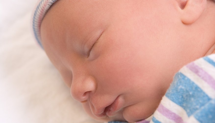 The sneezes of a newborn often cause concern for new moms. The sneezes of a newborn often cause concern for new moms.