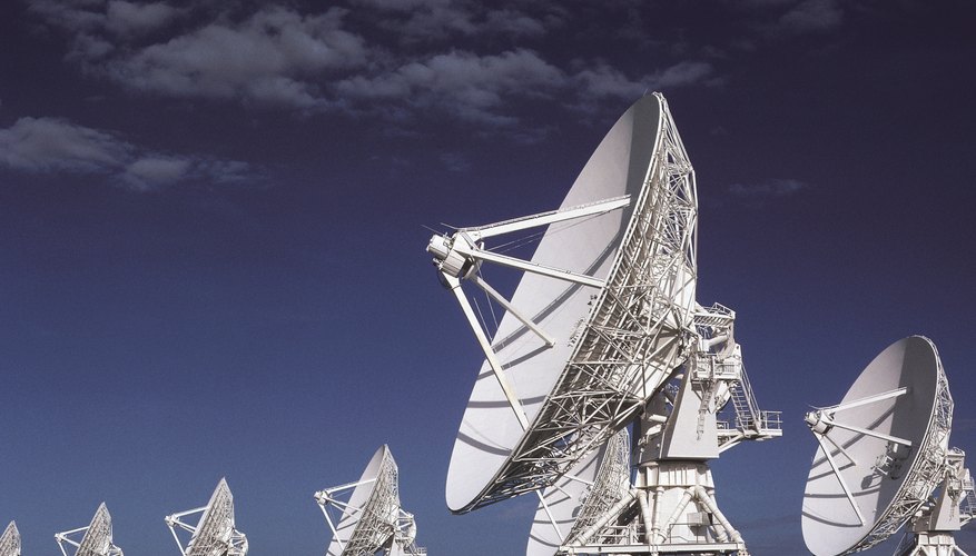 Photo Credit: Ablestock.com/AbleStock.com/Getty Images The curve of satellite dishes is parabolic.