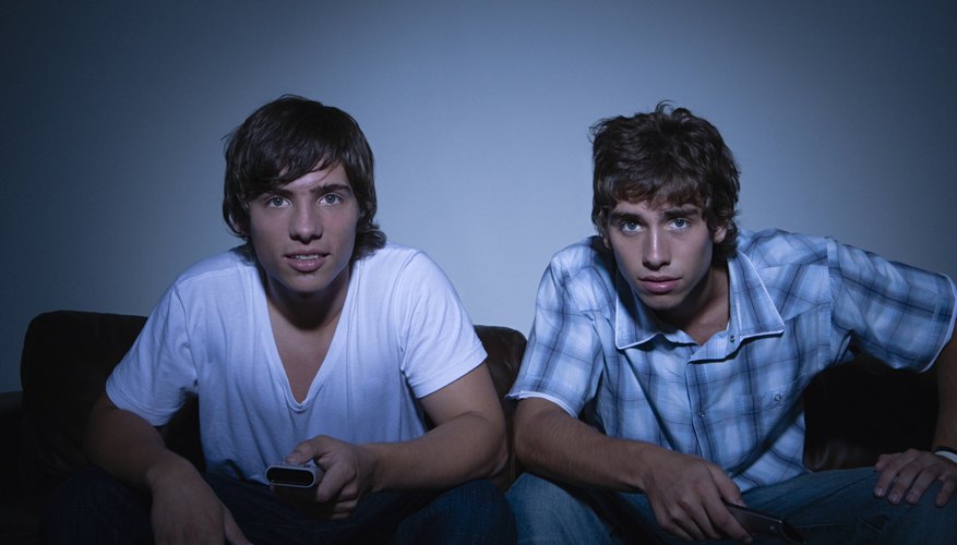 Teens watching TV Teens watching TV