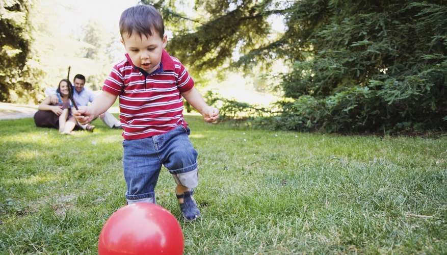 Young children enjoy outside games. Young children enjoy outside games.