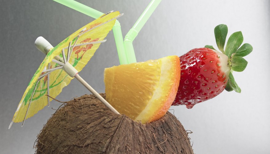 Serving up a tropical smoothie in a coconut adds a nice touch. Serving up a tropical smoothie in a coconut adds a nice touch.