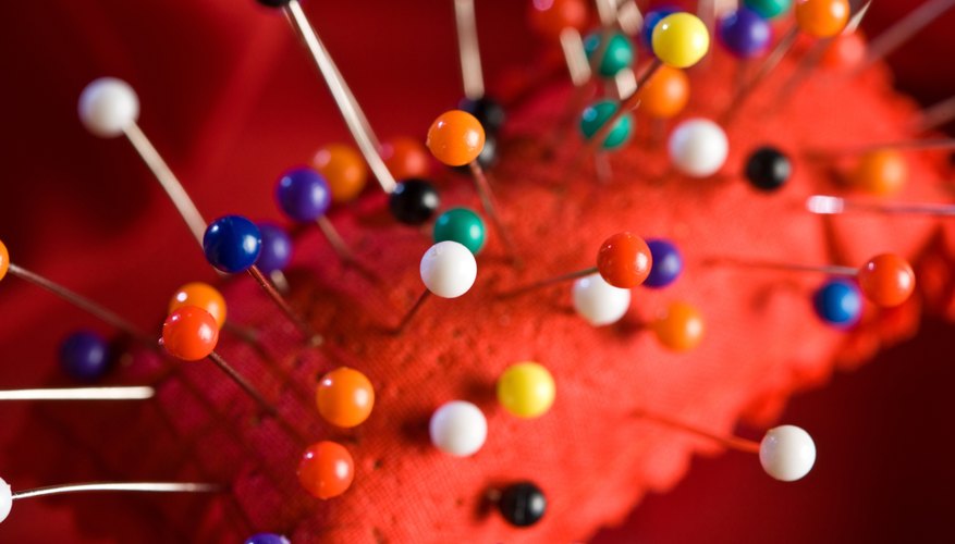 Pincushions contain sand, steel wool and other items. Pincushions contain sand, steel wool and other items.