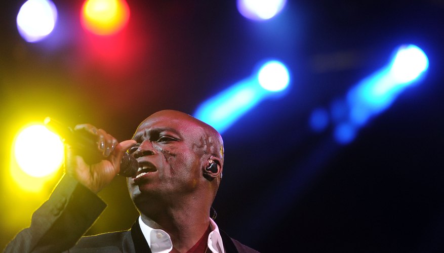 Photo Credit: Frazer Harrison/Getty Images Entertainment/Getty Images Singer Seal and stage lighting