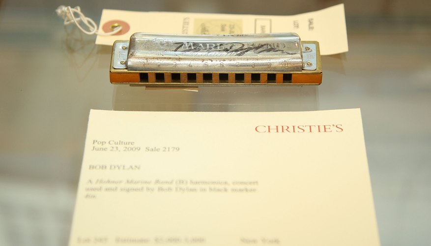 Photo Credit: Stephen Lovekin/Getty Images Entertainment/Getty Images Bob Dylan's harmonica on display at an auction.