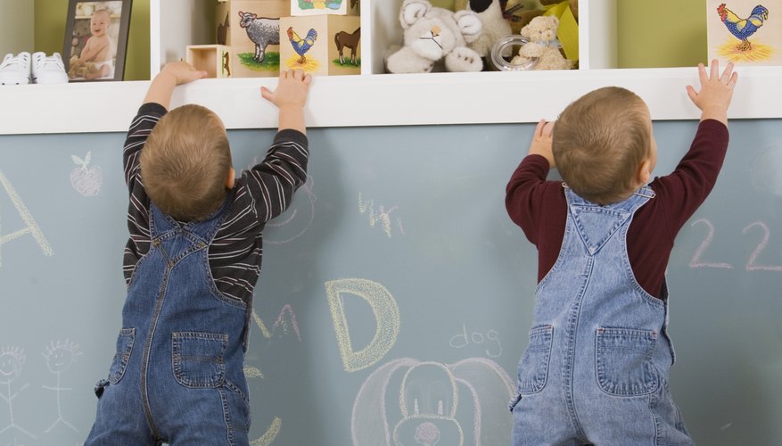 Your toddler twins will need safety railings on their beds to prevent tumbles. Your toddler twins will need safety railings on their beds to prevent tumbles.