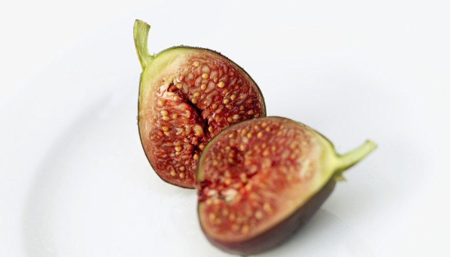 The cross-section of a fig on a plate. The cross-section of a fig on a plate.