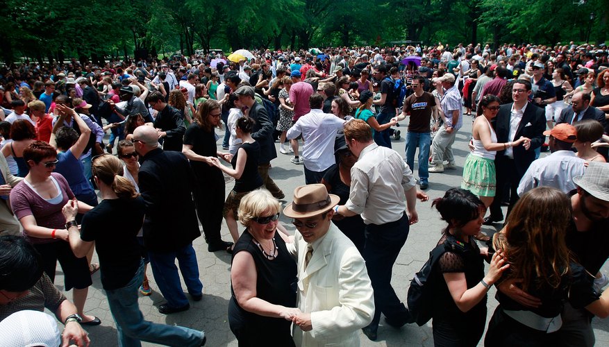 Photo Credit: Mario Tama/Getty Images News/Getty Images Couples swing dance in honor of legendary Lindy Hop pioneer Frankie Manning