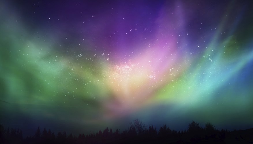 Charged particles colliding with atmospheric gases produce the aurora. Charged particles colliding with atmospheric gases produce the aurora.