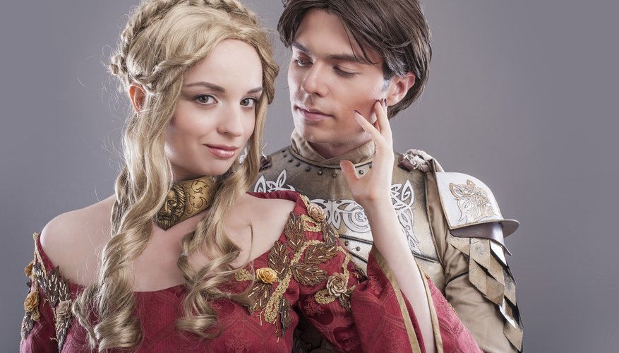 People dressed in medieval period clothing. People dressed in medieval period clothing.