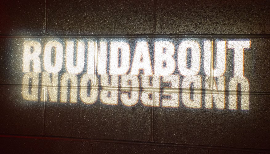 A Black Box Theater company displaying its name on a theater wall in New York City. A Black Box Theater company displaying its name on a theater wall in New York City.