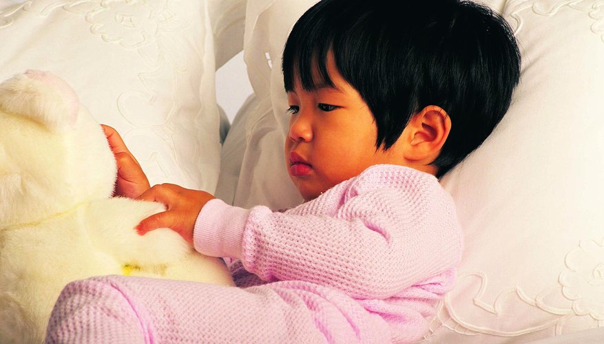 toddler laying in toddler bed toddler laying in toddler bed