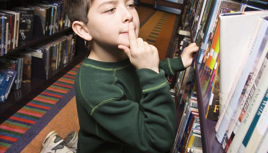 A library scavenger hunt challenges players to quickly find answers. A library scavenger hunt challenges players to quickly find answers.