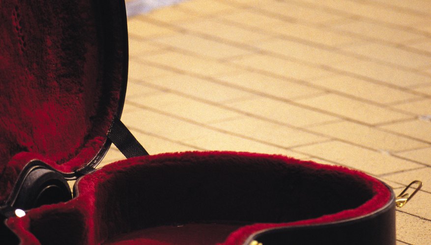 A guitar case lining helps protect a guitar. A guitar case lining helps protect a guitar.