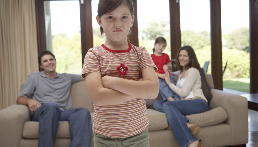 A middle child may perceive a lack of individual attention. A middle child may perceive a lack of individual attention.