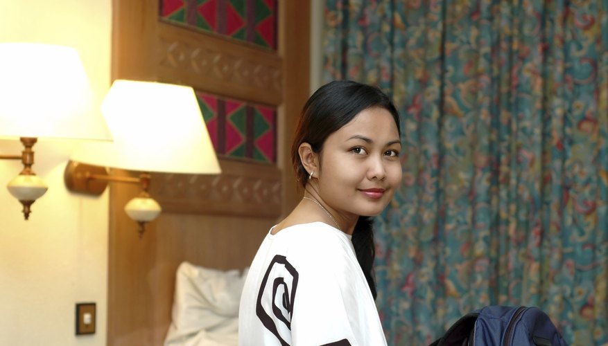 Smiling teenager in her room. Smiling teenager in her room.