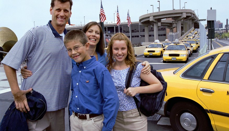 Families should follow seat belt laws while using a taxi. Families should follow seat belt laws while using a taxi.