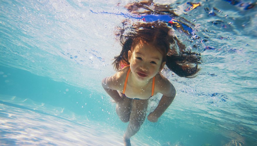 Swimming is a calming influence on some children with autism. Swimming is a calming influence on some children with autism.