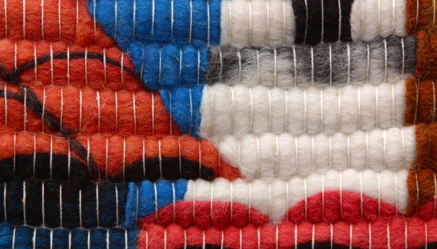 Weaving cloth starts with threading the loom properly. Weaving cloth starts with threading the loom properly.